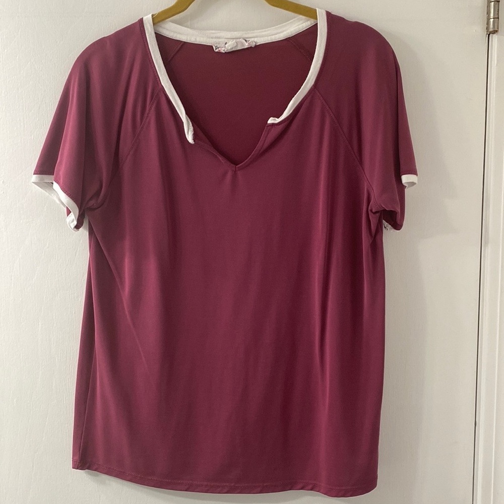 Dark purple and white lined tee shirt.